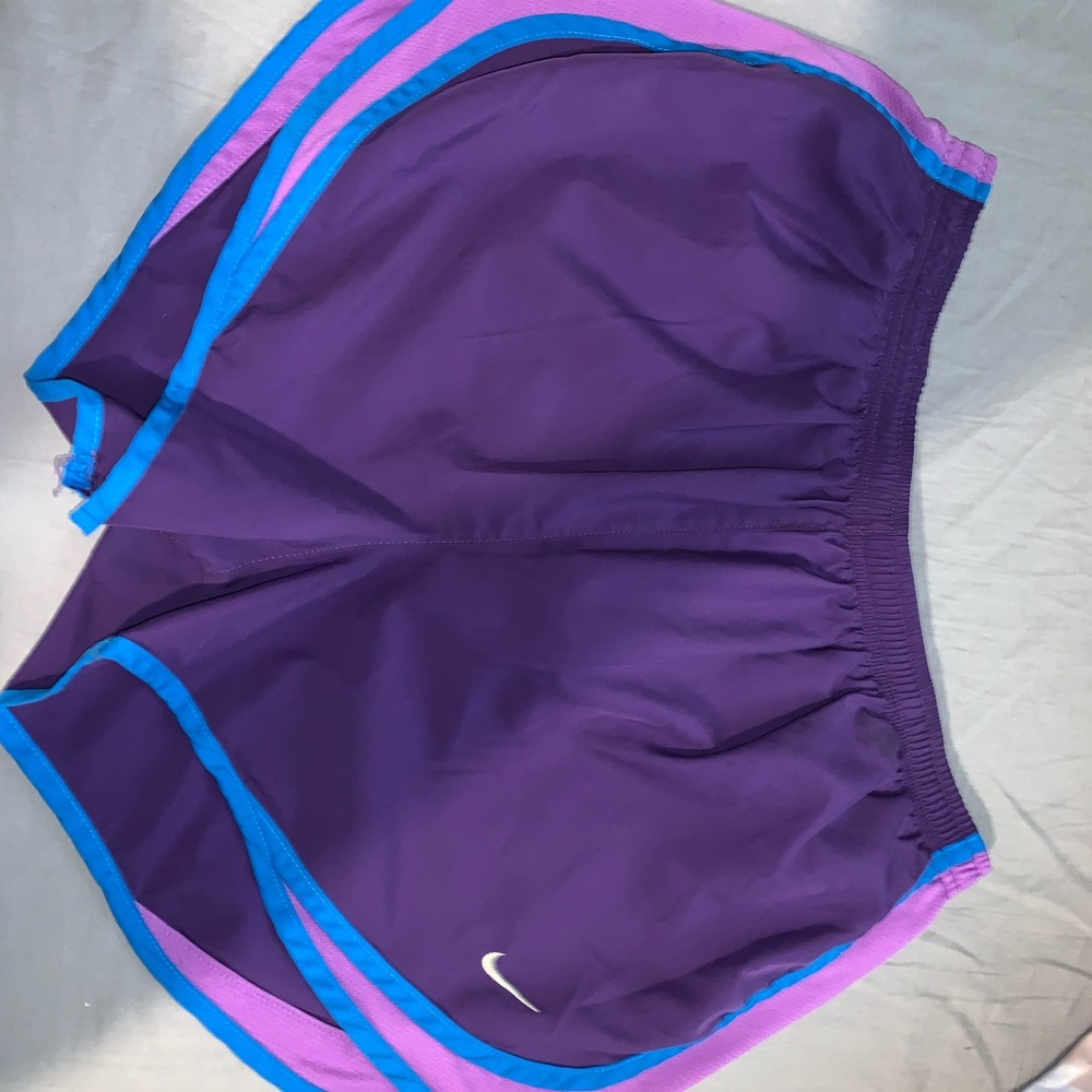 Large athletic Nike running shorts